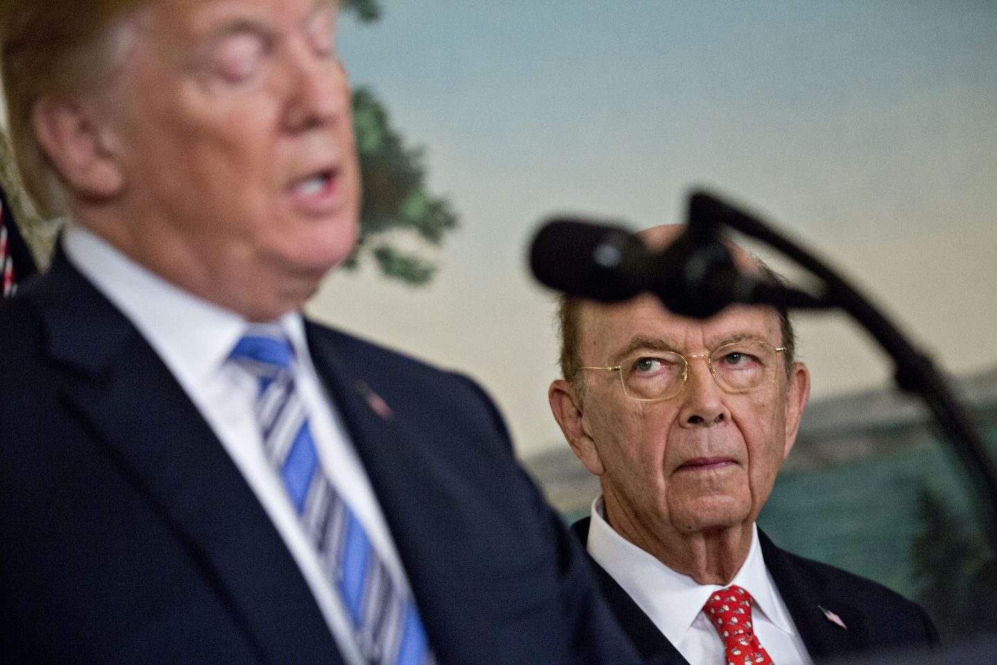 Wilbur Ross, former U.S. commerce secretary, listens as U.S. President Donald Trump