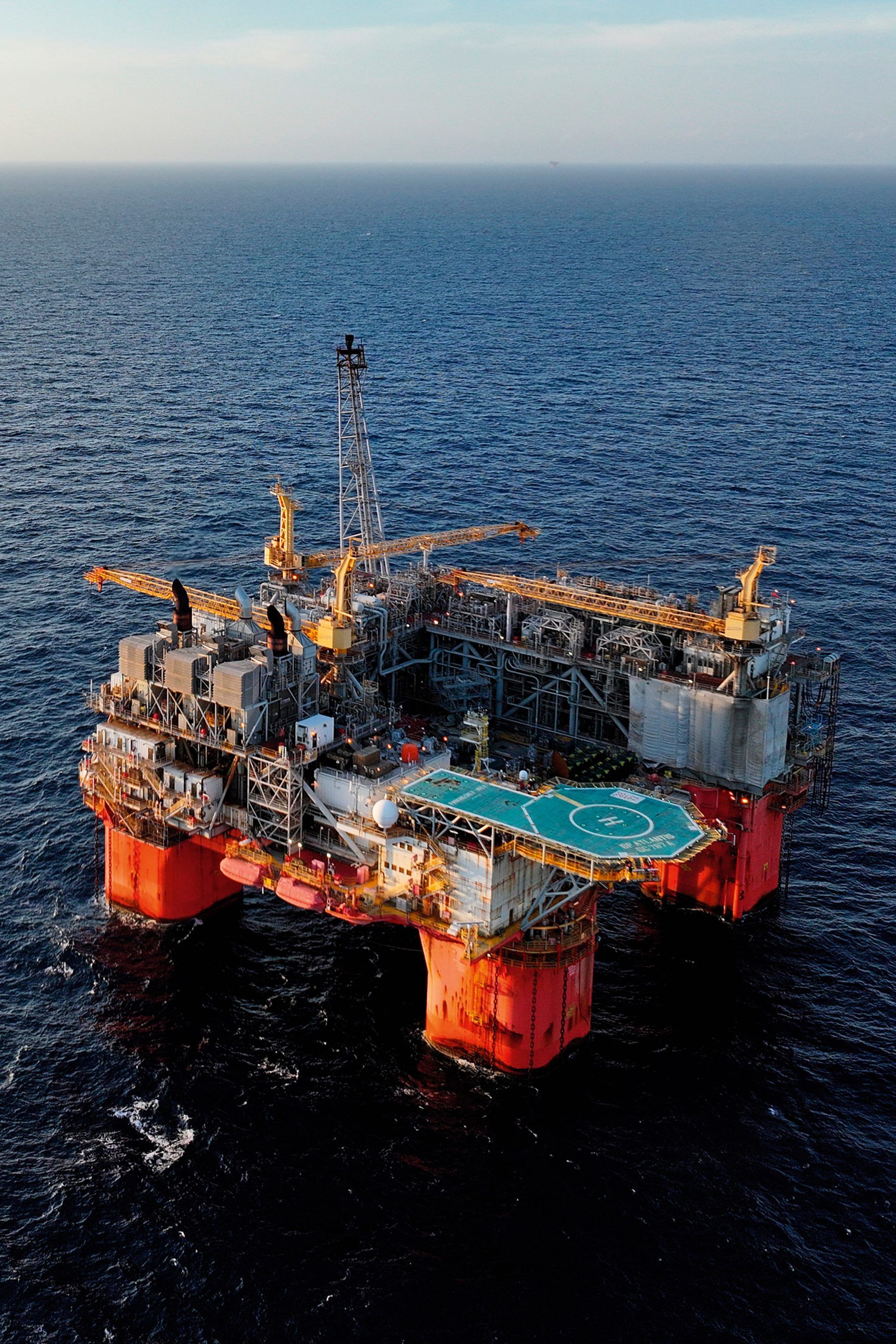 BP is investing more in oil and gas efforts like its Atlantis platform in the Gulf of Mexico.