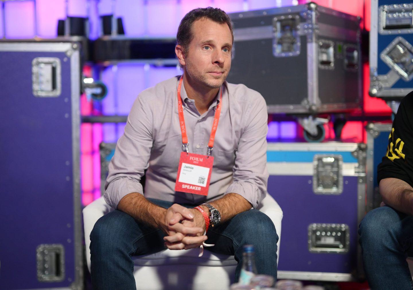 Jamie Siminoff, founder of Ring, sitting on stage