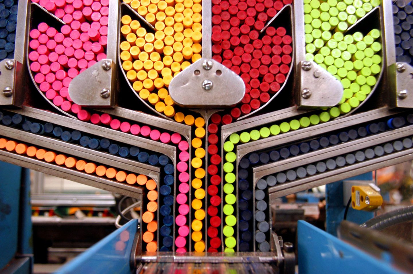 A packaging machine sorts crayons while moving them toward individual boxes at Binney and Smith, Inc., the manufacturer of Crayola crayons, June 18, 2003, in Easton, Pennsylvania.