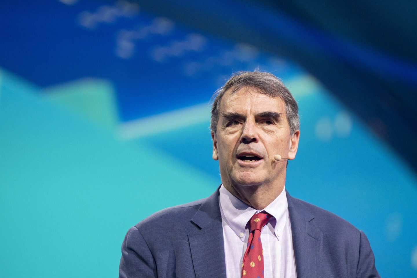 Tim Draper often wears a Bitcoin-branded tie.