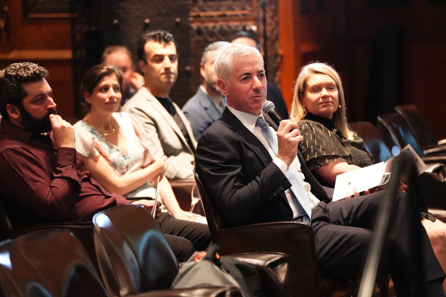 Bill Ackman speaks into a microphone