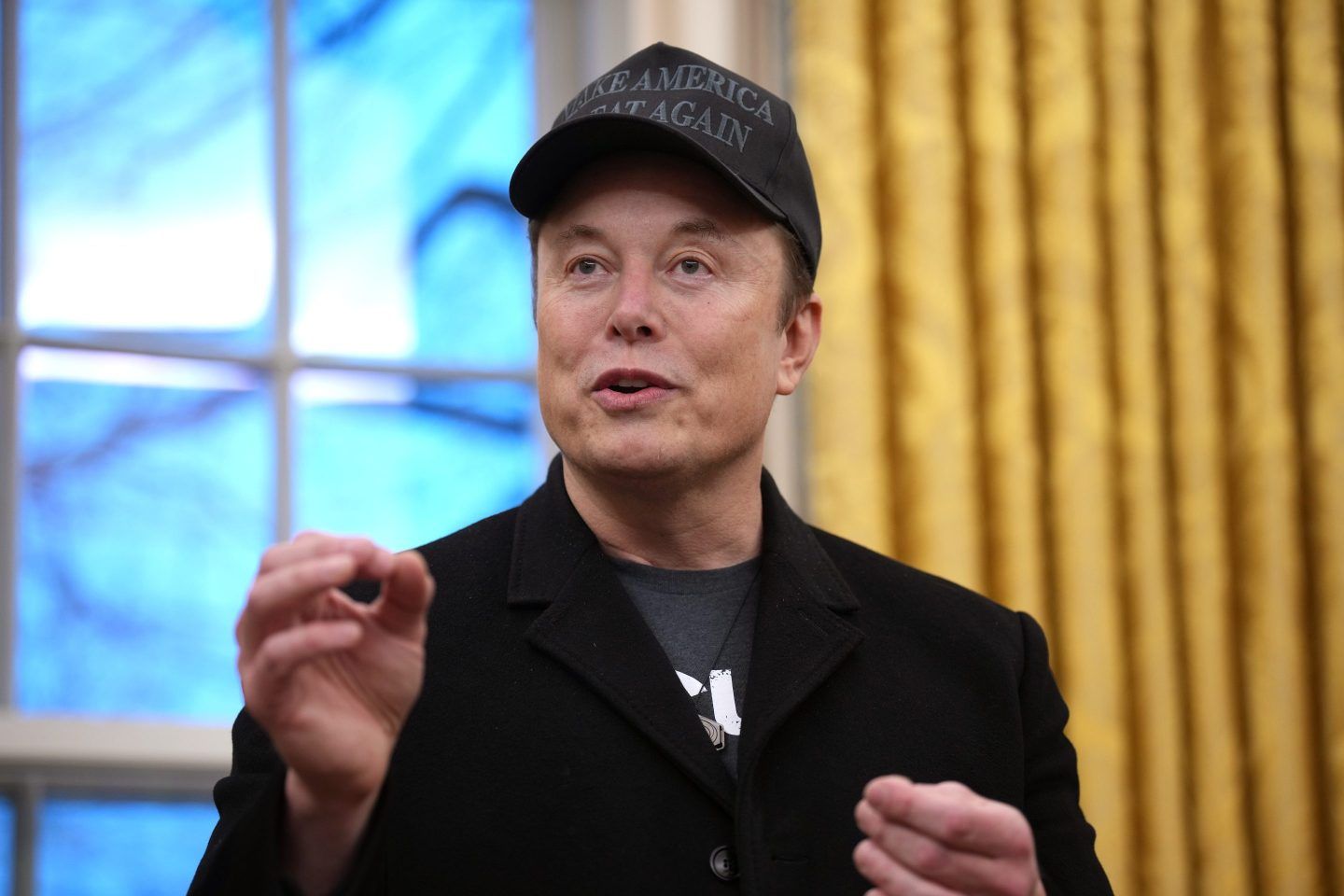 Tesla and SpaceX CEO Elon Musk delivers remarks as he joins U.S. President Donald Trump during an executive order signing in the Oval Office at the White House on February 11, 2025 in Washington, DC.