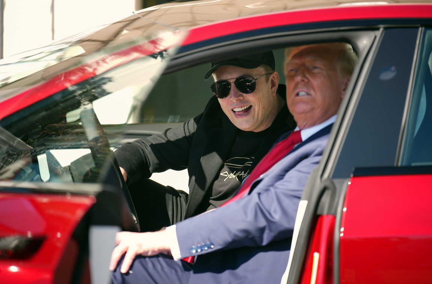 U.S. President Donald Trump and White House Senior Advisor, Tesla and SpaceX CEO Elon Musk sit in a Model S on the South Lawn of the White House on March 11, 2025 in Washington, DC.