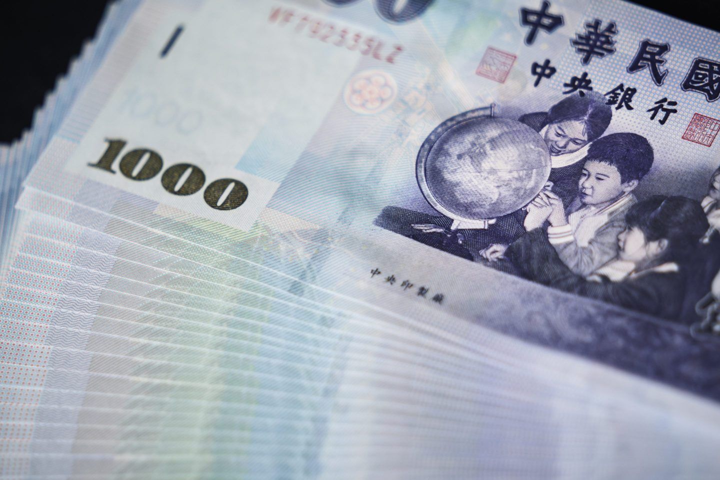 Taiwanese one thousand dollar banknotes arranged in Taipei on May 6, 2025.