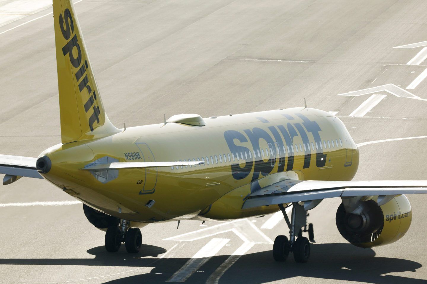 A Spirit Airlines plane on the runway