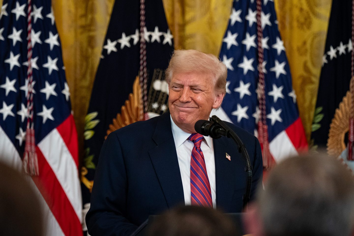 Photo: US President Donald Trump during a signing ceremony for the GENIUS Act in the East Room of the White House in Washington, DC, US, on Friday, July 18, 2025. Trump signed the first federal bill to regulate stablecoins, hailing it as a "giant step to cement American dominance of global finance and crypto technology" and delivering a major victory for the digital asset industry. Photographer: Al Drago/Bloomberg via Getty Images