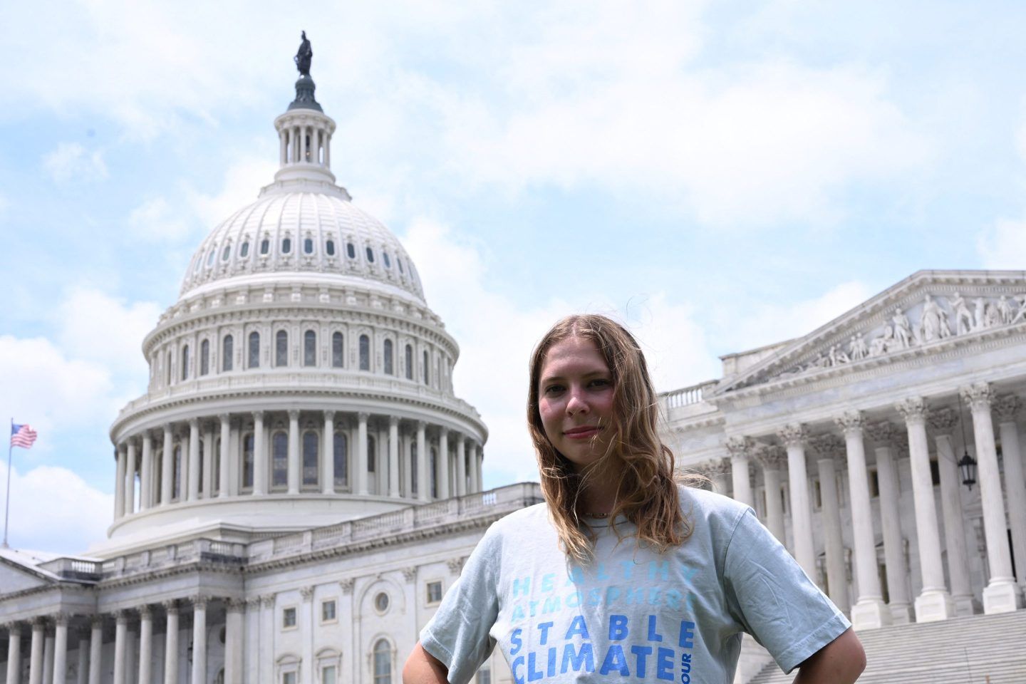 Eva Lighthiser, 19, of Montana, the lead plaintiff in Lighthiser v. Trump, a climate lawsuit, poses for a portrait at the U.S. Capitol in Washington, DC, on July 16, 2025.