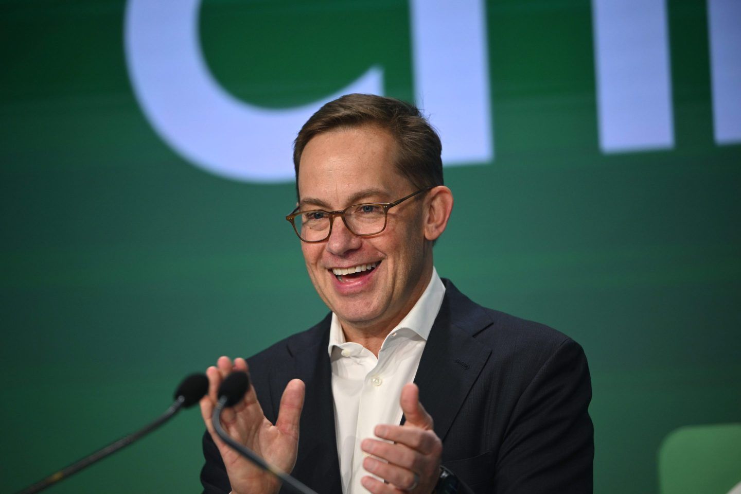 Chris Britt, co-founder and CEO of Chime Financial, joined a group of employees and family members to celebrate the fintech's debut at Nasdaq. 