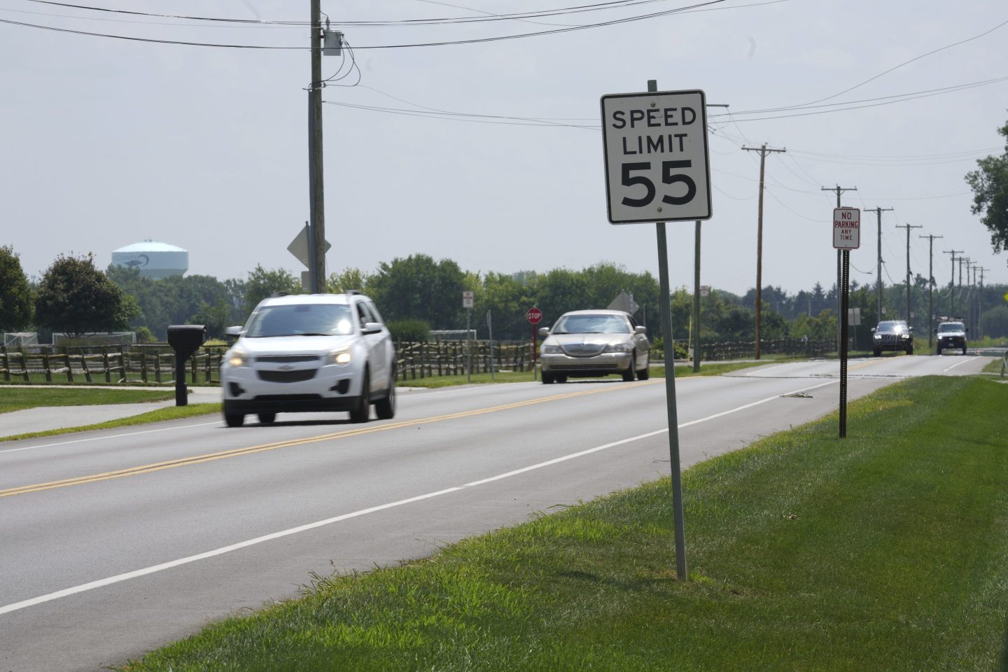 Vehicles drive along Mitchaw Road past Pacesetter Park in Sylvania Township, Ohio.