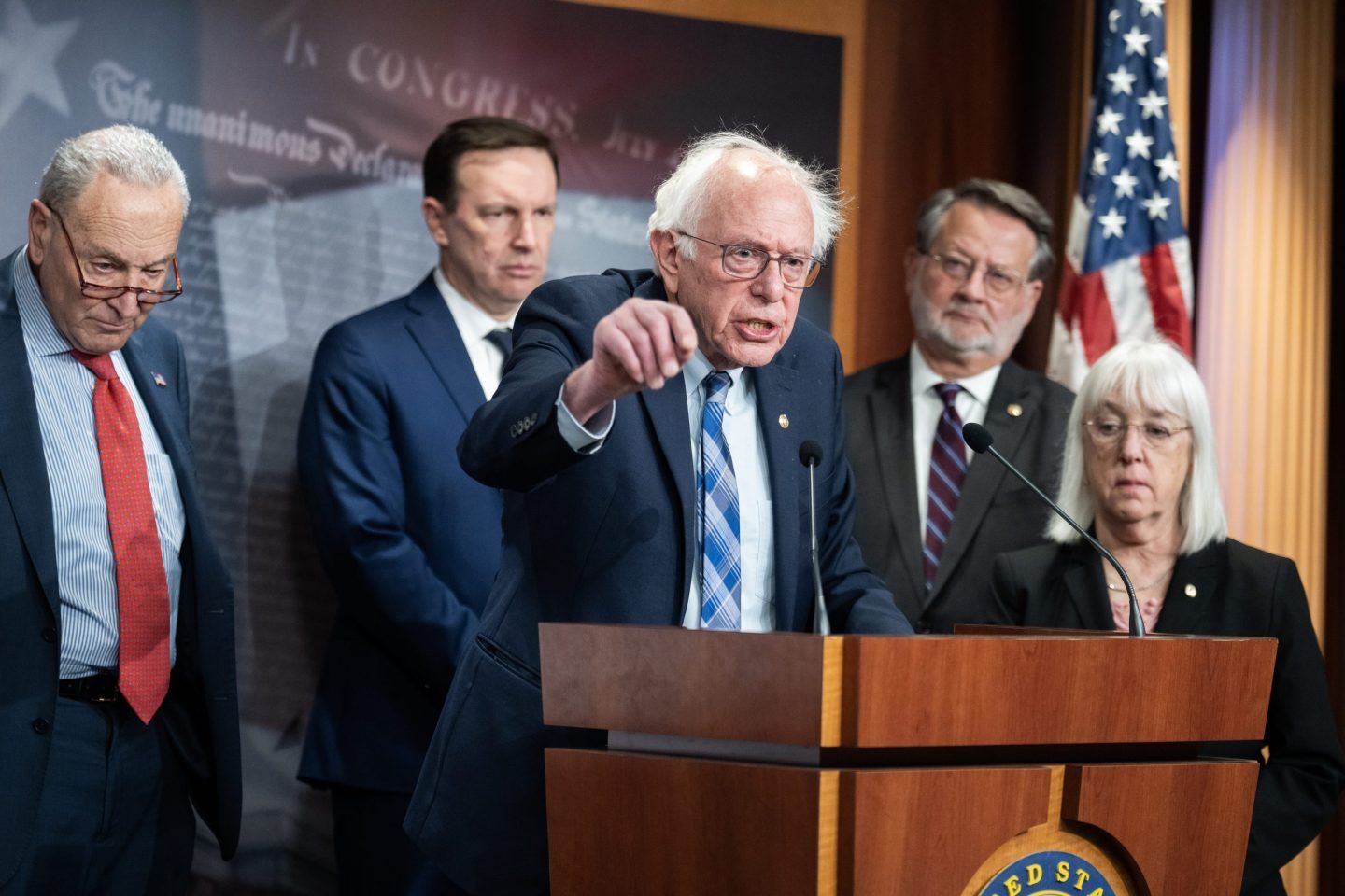 From left, Senate Minority Leader Charles Schumer, D-N.Y., Sens. Chris Murphy, D-Conn., Bernie Sanders, I-Vt., Gary Peters, D-Mich., and Patty Murray, D-Wash., conduct a news conference to oppose President Donald Trump's executive order to abolish the Department Of Education