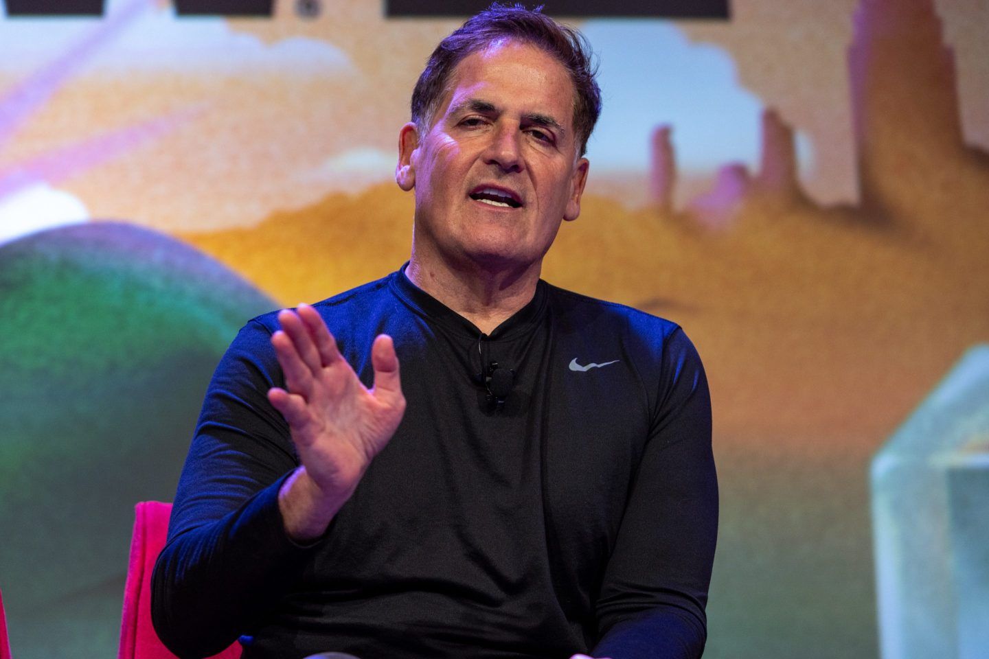 Mark Cuban with his hand up