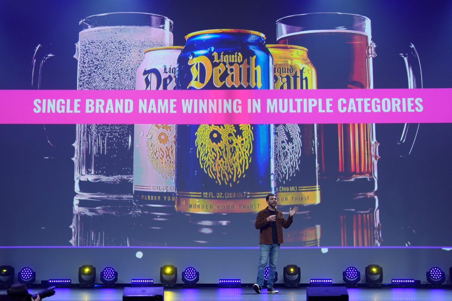 Mike Cessario, founder and CEO of Liquid Death, speaks during the OMR digital and marketing trade fair in the exhibition halls.