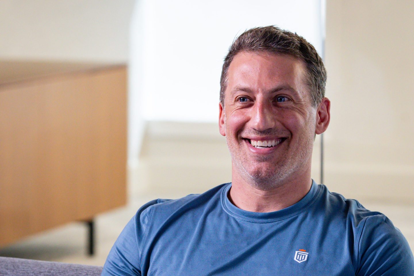 An image of Alex Spiro smiling and looking off camera.