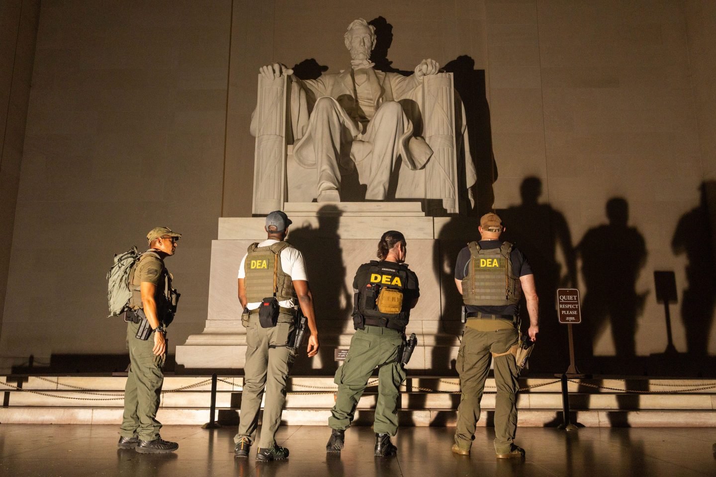 DEA agents stand around the Lincoln Memorial