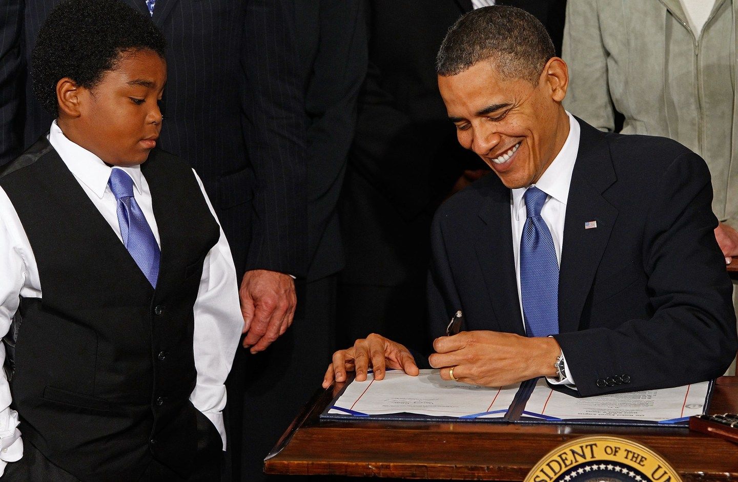 President Barack Obama signs the Affordable Health Care for America Act during a ceremony with fellow Democrats in the East Room of the White House March 23, 2010 in Washington, DC.