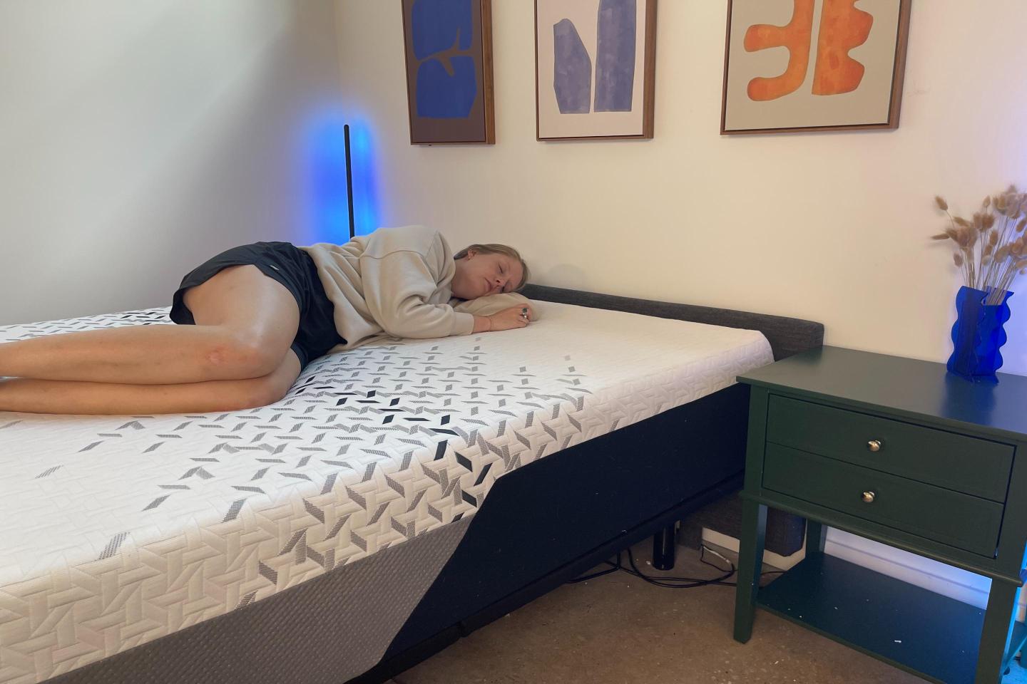 Our tester lying on the Nectar Luxe Memory Foam