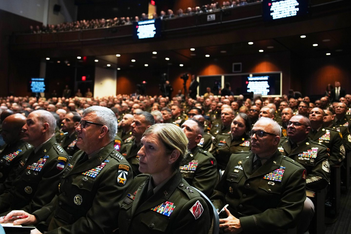 U.S. military senior leadership listen as President Donald Trump speaks at Marine Corps Base Quantico, Tuesday, Sept. 30, 2025 in Quantico, Va.