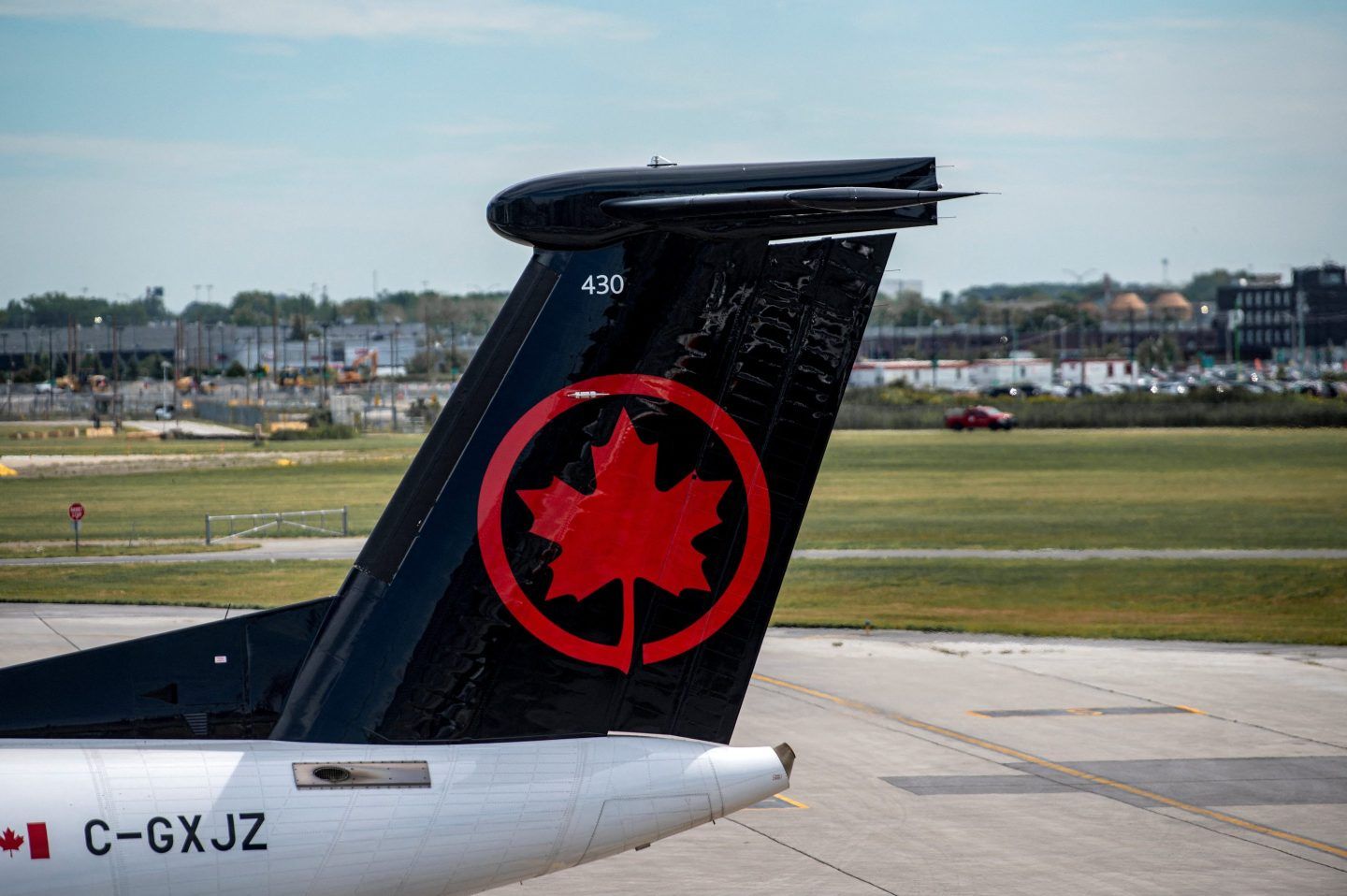 An Air Canada Express plane sits on the tarmac after landing as Air Canada flights are slated to resume as early as this evening at Pierre-Elliott Trudeau Airport in Montreal.