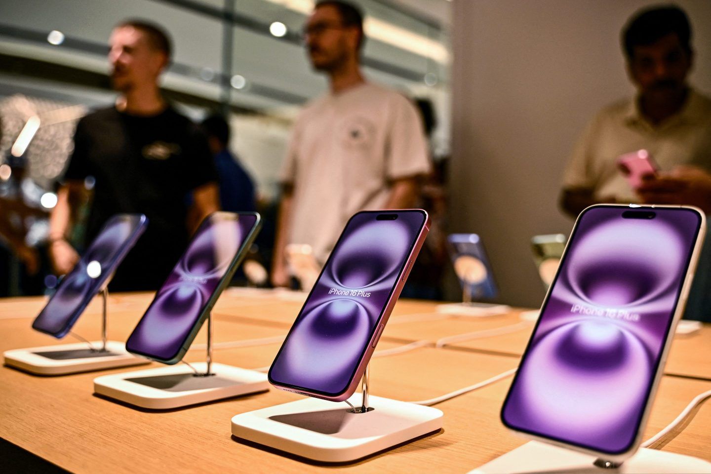 iPhone 16 Plus models of U.S. tech giant Apple Inc. are displayed for sale at the Phoenix Mall on the opening day of the first Apple retail store in Bengaluru on September 2, 2025. 
