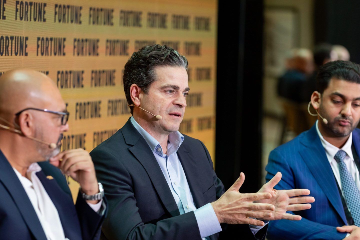 Jose La Loggia, EMEA group president for the HVAC giant Trane Technologies, speaks at the Coins2Day Global Forum in Riyadh about the transition for cleaner and more affordable energy. He spoke on a panel with Lucid Motors Middle East President Faisal Sultan, left, and Gemini Corp. CEO Kunaal Patawari, right.