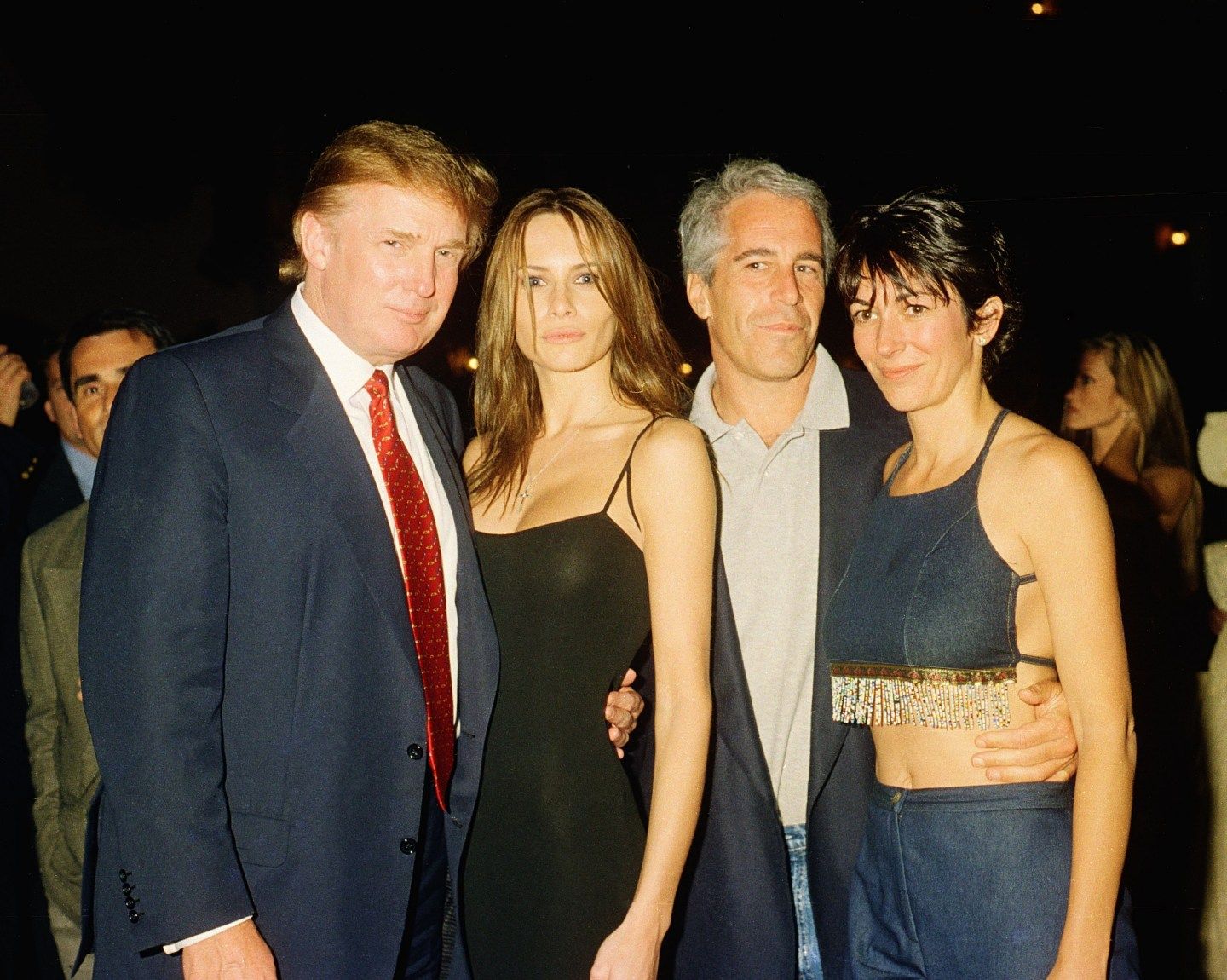 Donald Trump, Melania Trump, Jeffrey Epstein and Ghislaine Maxwell pose for a photo together