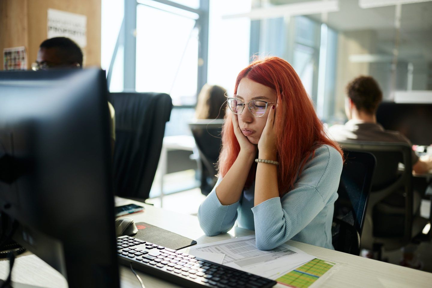 Gen Z worker at office struggling