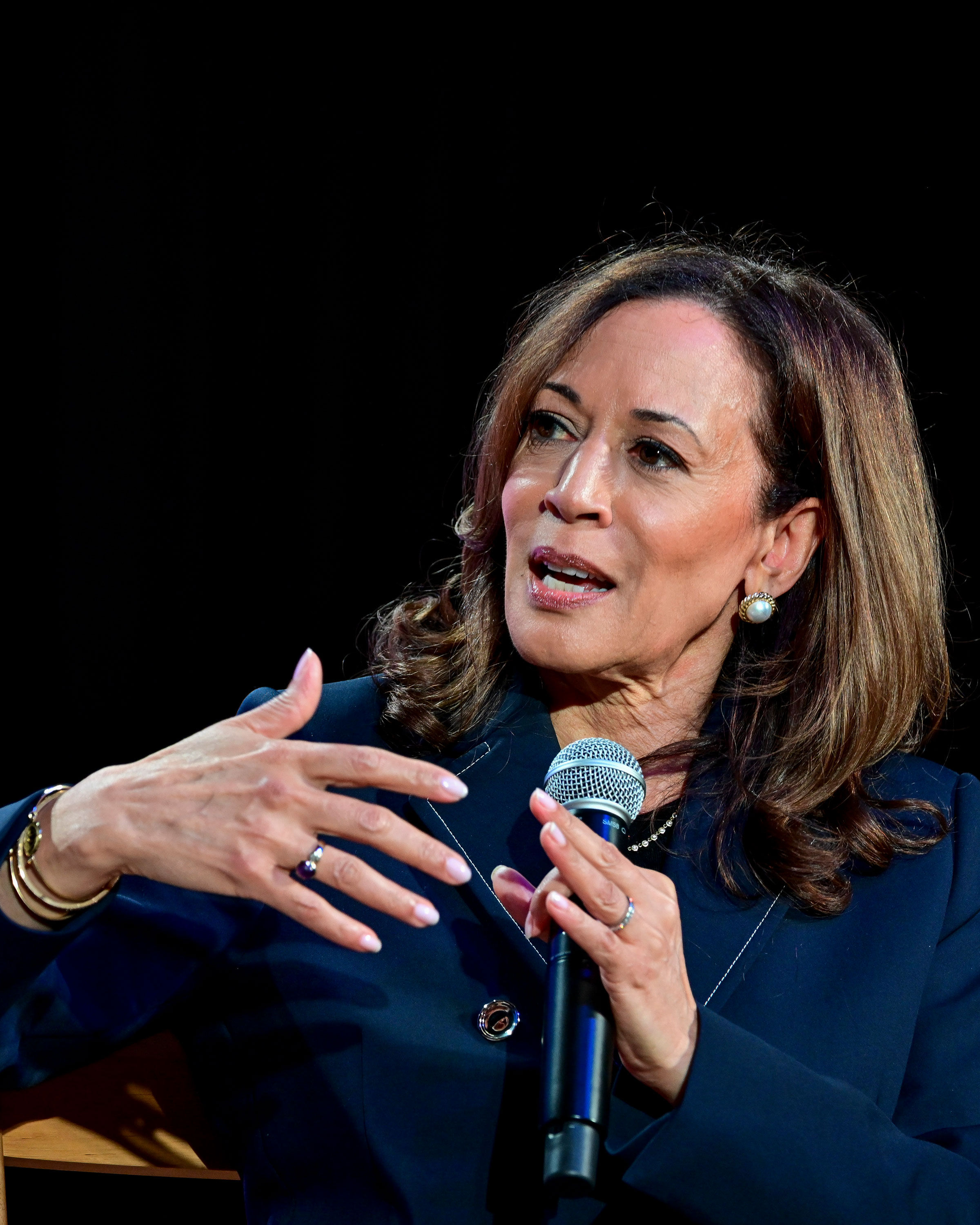 Vice President Kamala Harris in the middle of a conversation.
