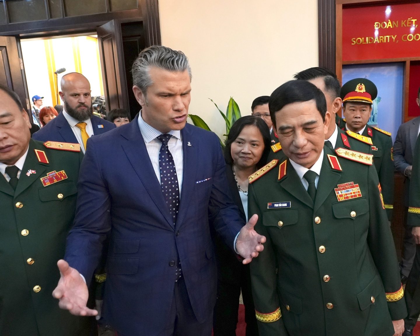U.S. Defense Secretary Pete Hegseth speaks to Vietnamese Defense Minister Phan Van Giang before a meeting in Hanoi, Vietnam, Sunday, Nov. 2, 2025. 