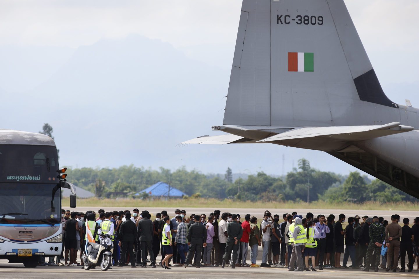 India nationals, believed to have worked at scam center in Myanmar, board a plane at Thailand's Mae Sot International Airport in Tak, before being sent back to India Thursday, Nov. 6, 2025. (AP Photo/Sarot Meksophawannakul)