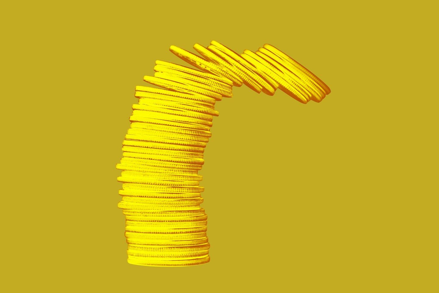 A stack of coins tumbles over on top of a solid background.