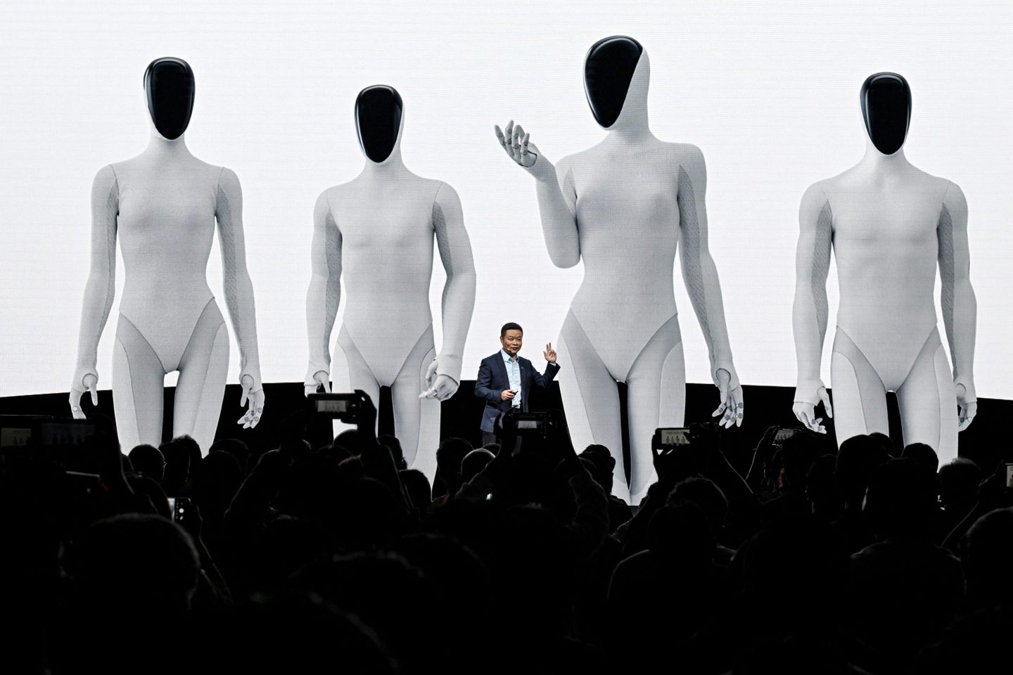 Xpeng CEO He Xiaopeng launches its Iron humanoid robot during AI Day at its headquarters in Guangzhou, China on Nov. 5, 2025.