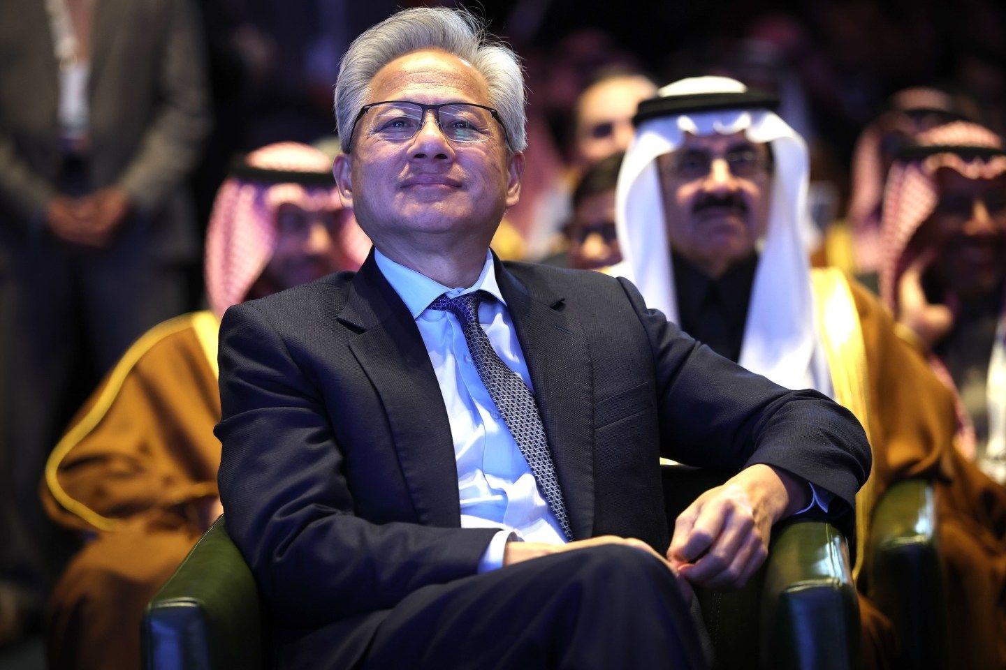 Photo: WASHINGTON, DC - NOVEMBER 19: Nvidia CEO Jensen Huang listens as U.S. President Donald Trump speaks at the U.S.-Saudi Investment Forum at the Kennedy Center on November 19, 2025 in Washington, DC. The forum is intended to bring together business leaders, innovators and political leaders with the goal of strengthening economic ties and promoting investment between the United States and Saudi Arabia.
