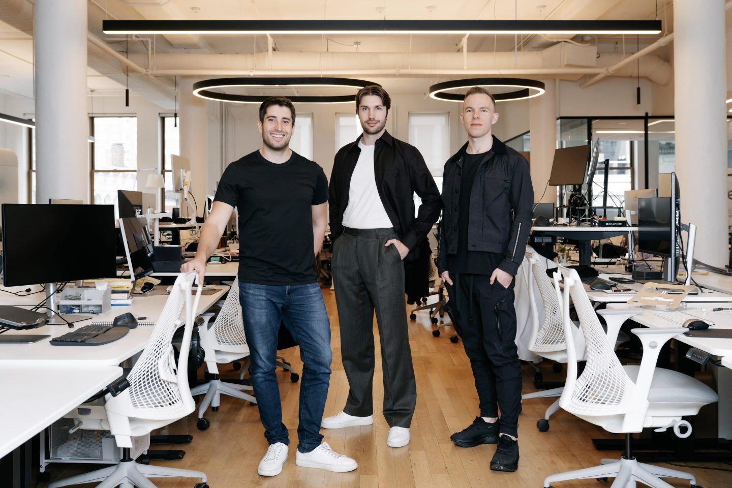 Graphite team standing in an office