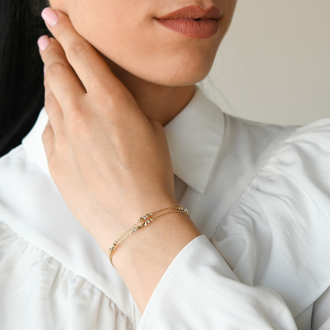 brățară din aur galben de 14K cu elemente fațetate  2