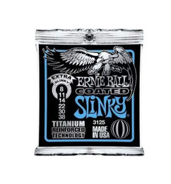 Ofertas de Cuerdas Ernie Ball 3125 Titanium para guitarra electrica con  2 Picks de regalo