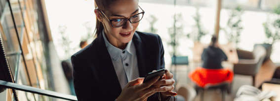 Woman reading on mobile phone