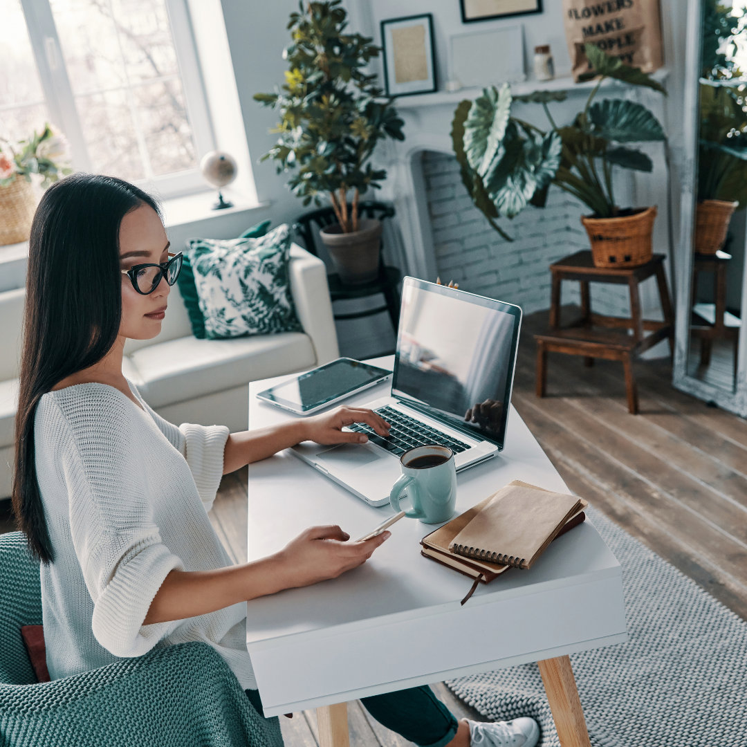 a productive woman in a work from home setup