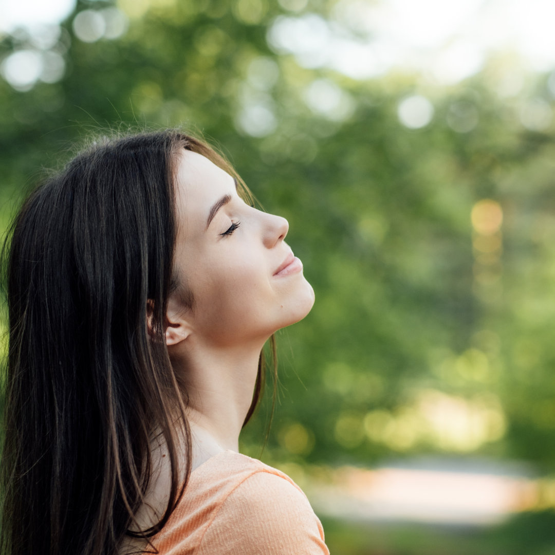 a lady embracing the nature