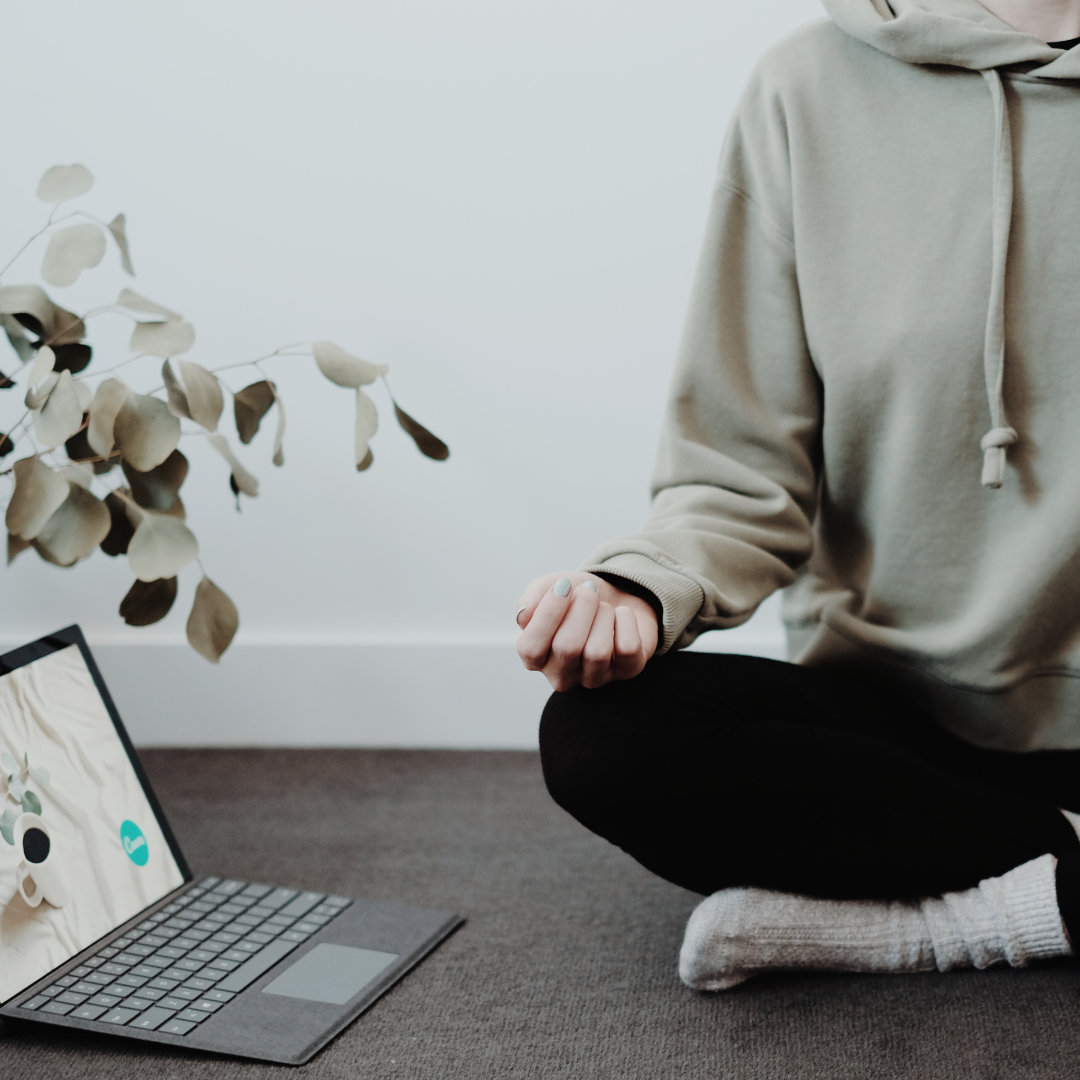 a person meditating while working