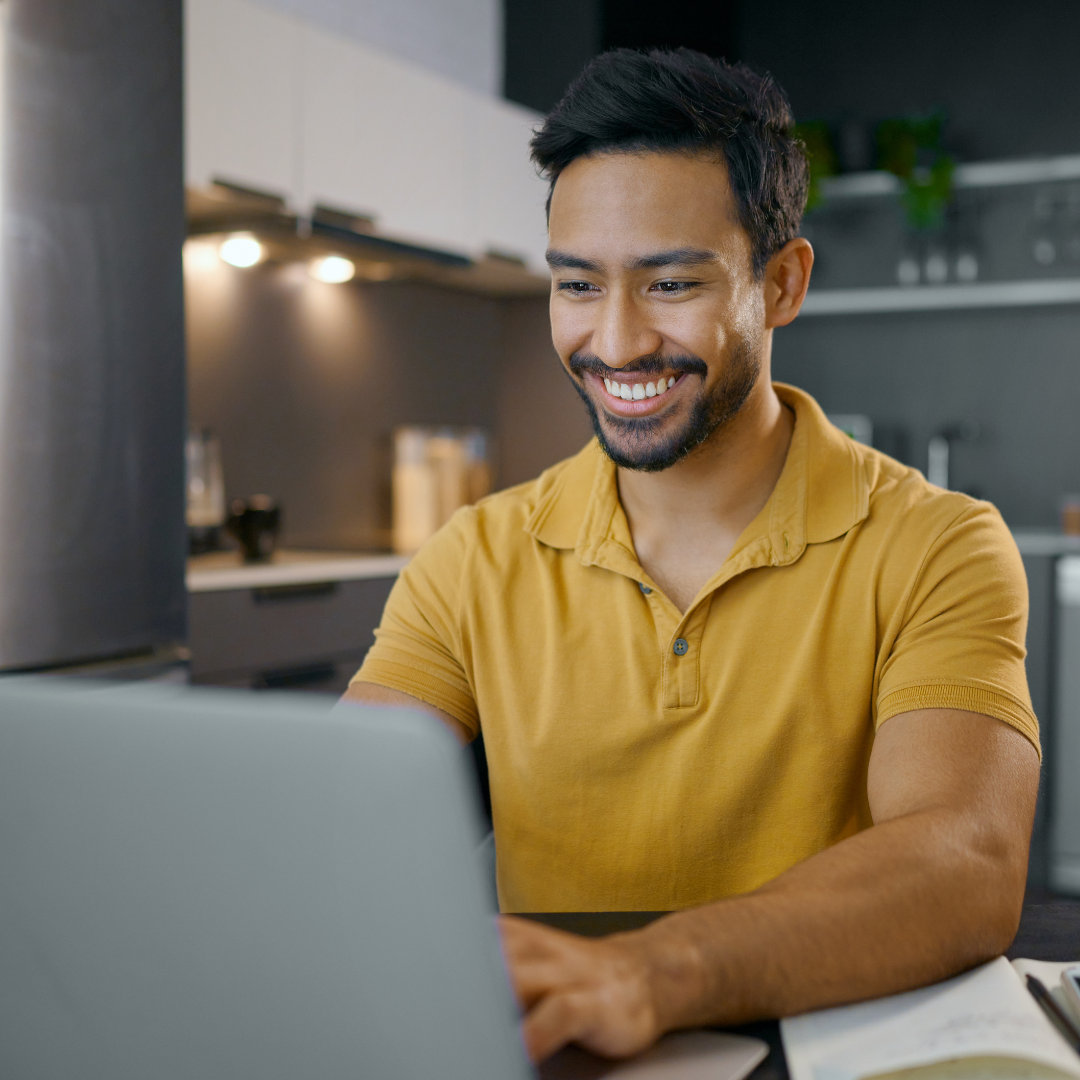 a man working in a small office space