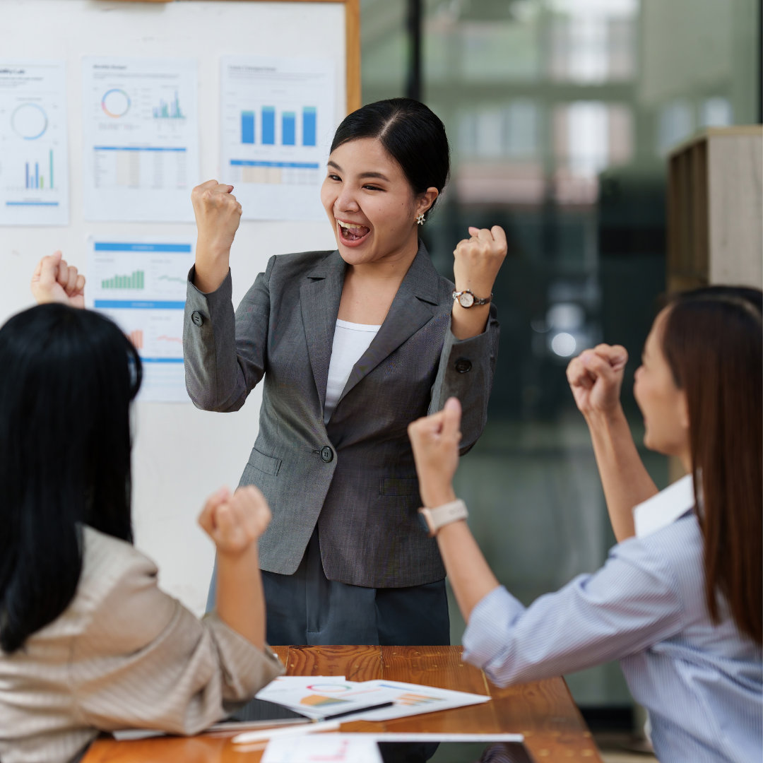 three woman in small office space