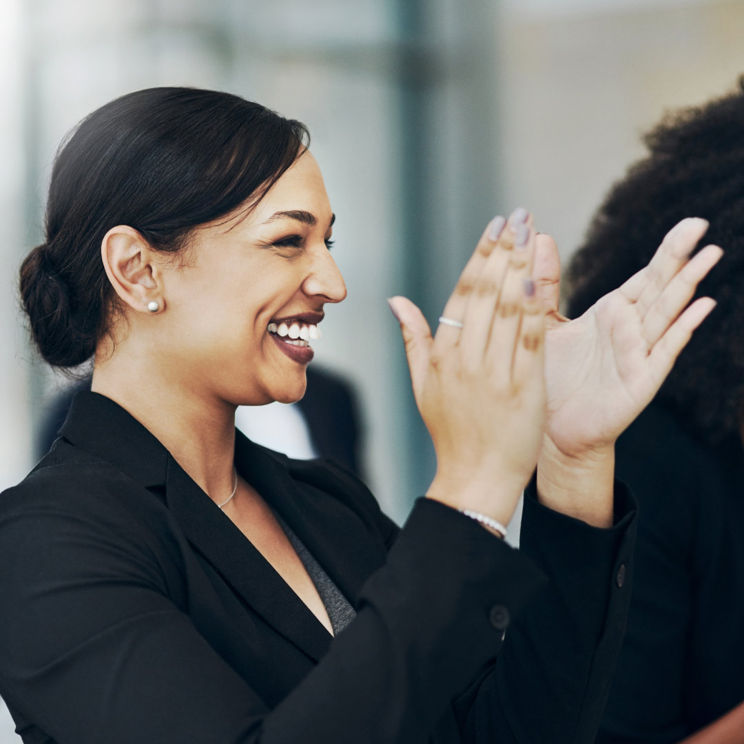 smiling female coworking spaces