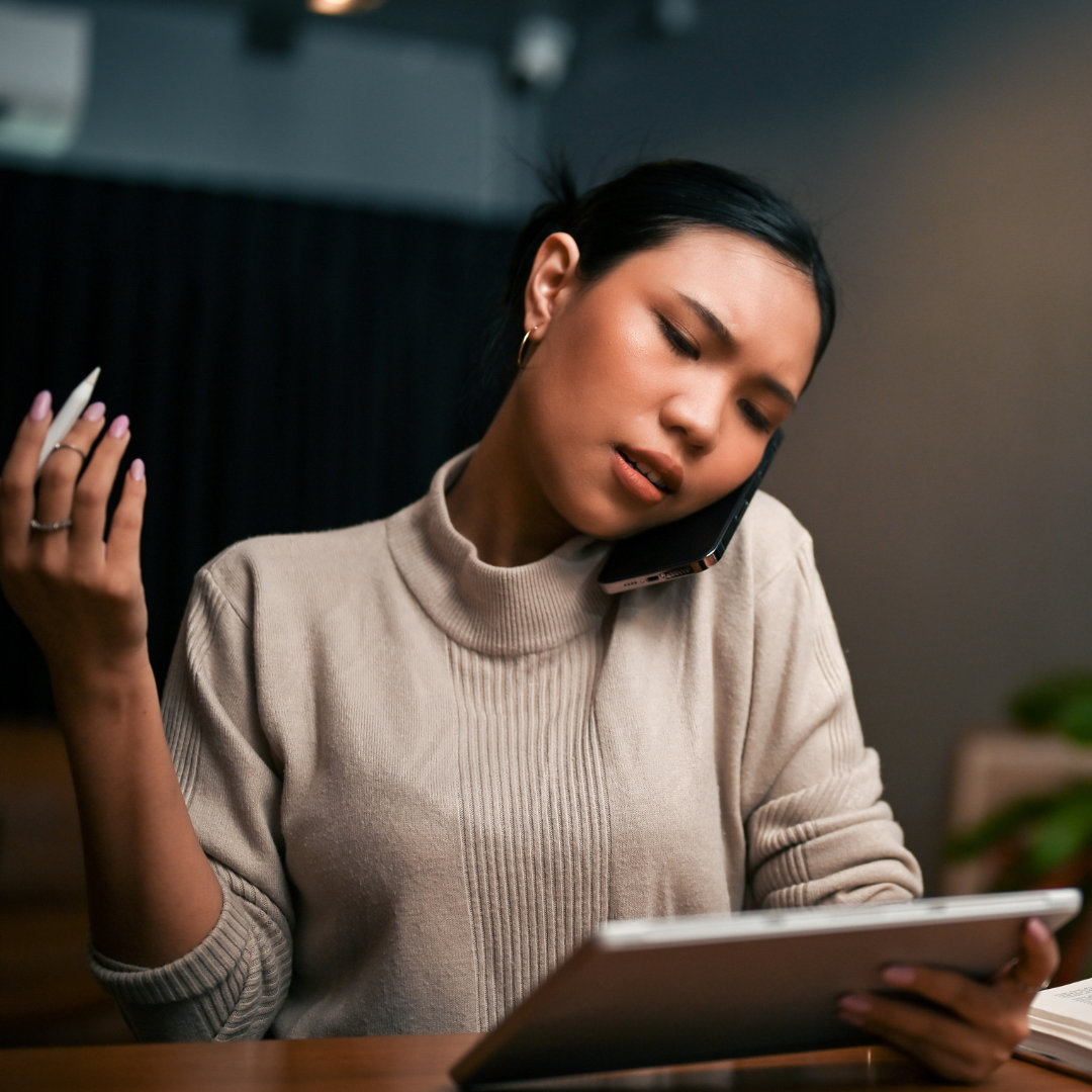 a woman talking with someone in a phone