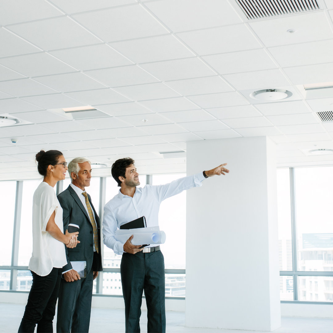 three people in a private office