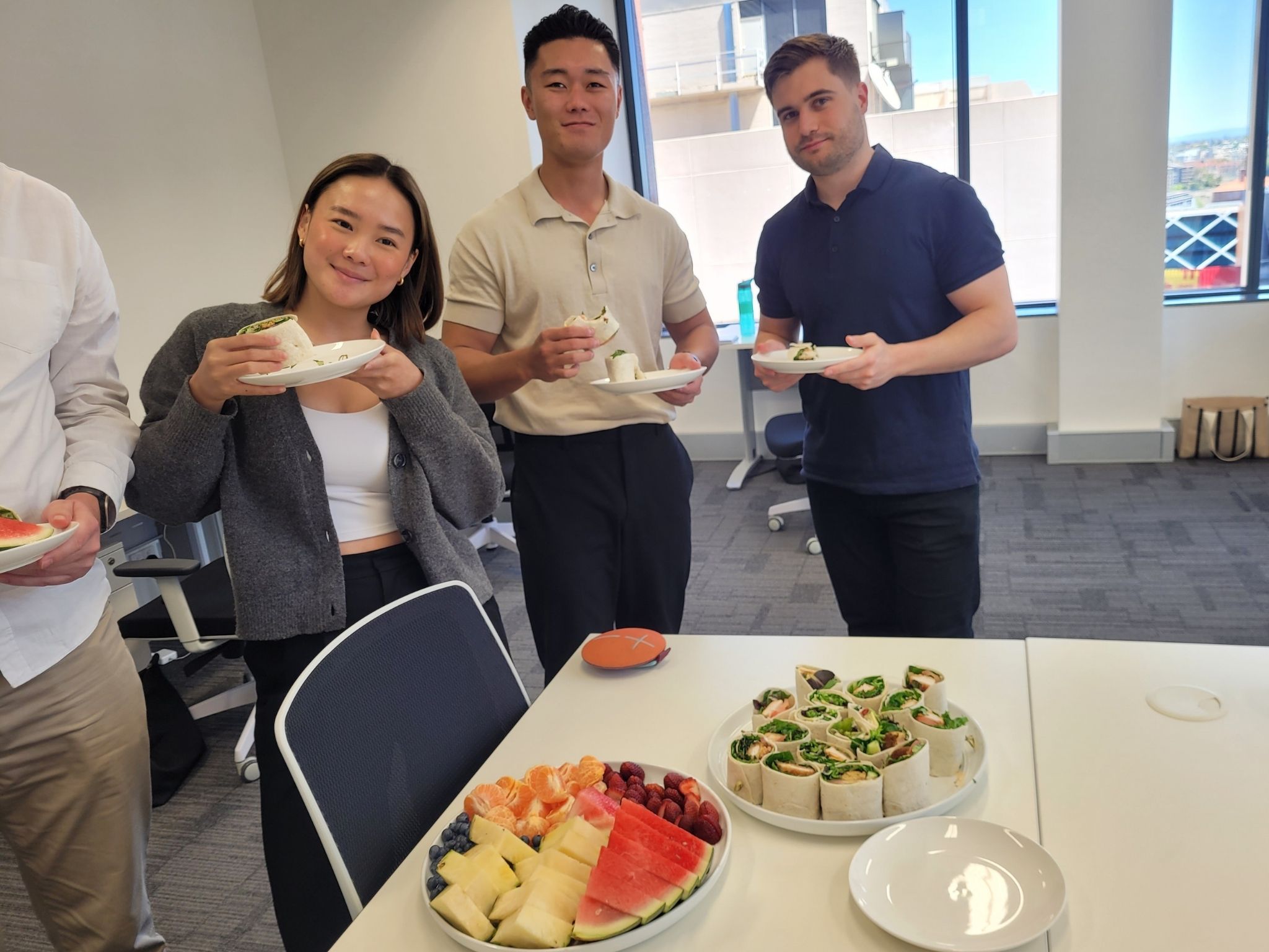 Gourmet wraps and a fruit platter for lunch.