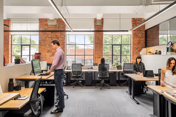 Hot Desk vs. Dedicated Desk: Which Workspace is Best for Your Business?