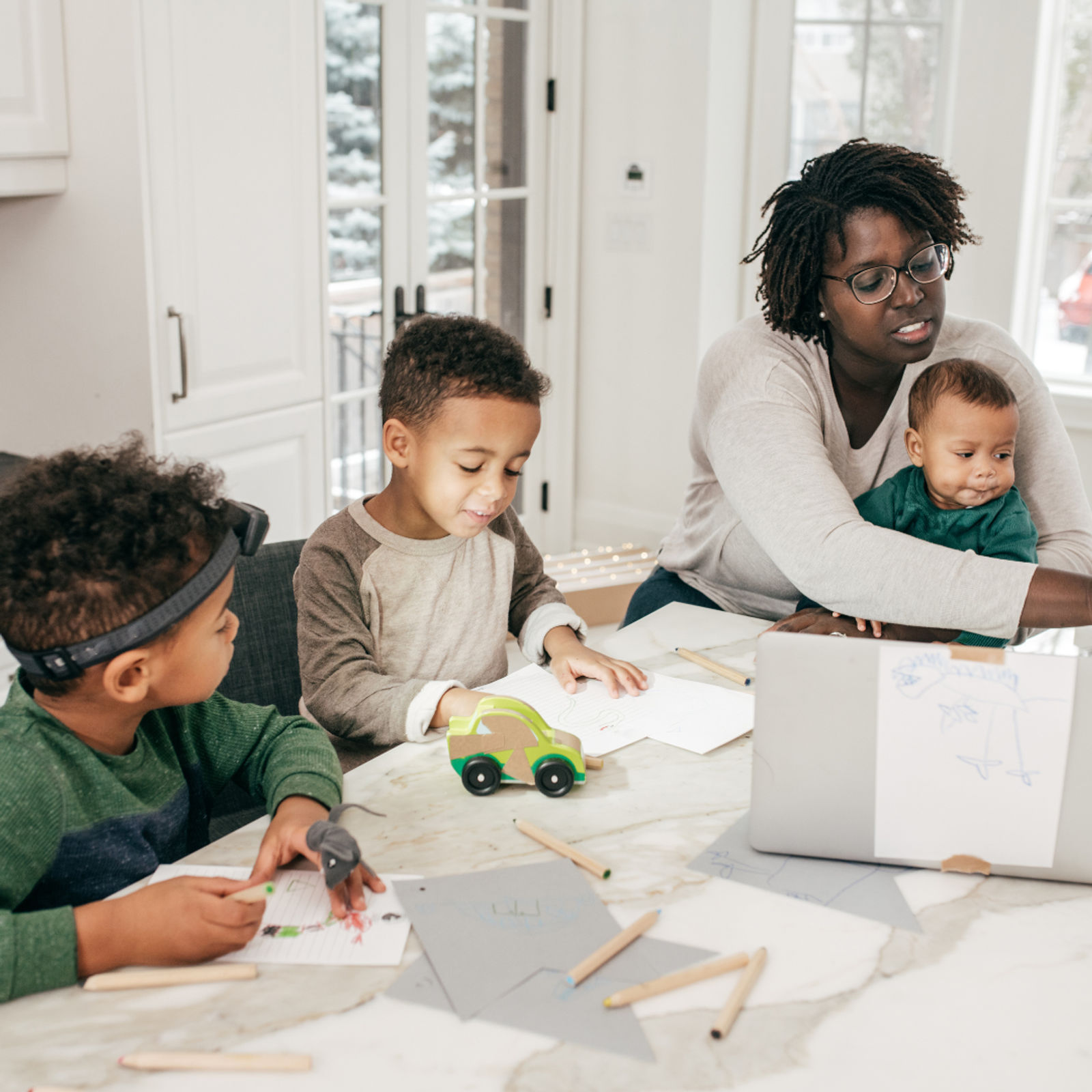 mother and her children in a flexible working mode