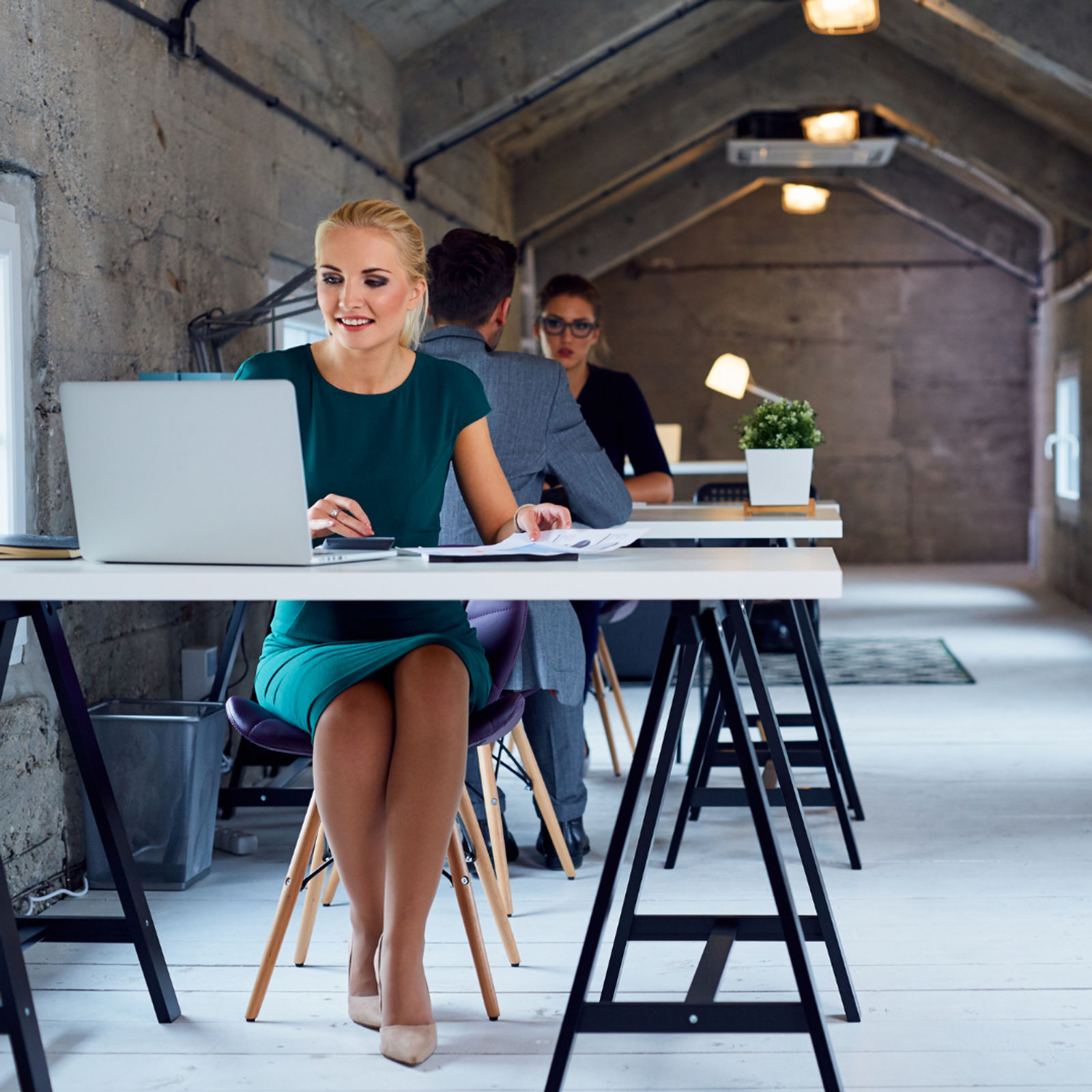 employees working in a flexible coworking space