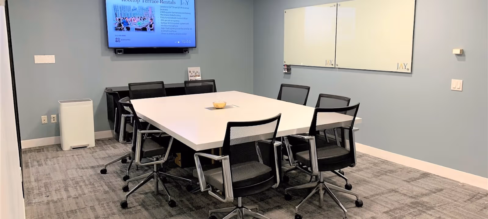 https://officehub.s3.amazonaws.com/Assets/images/4837/Serviced-Office-%28Classic%29-NY-New-York-40-Wall-Street-Meeting-Room-D-Seats-8-People.jpg